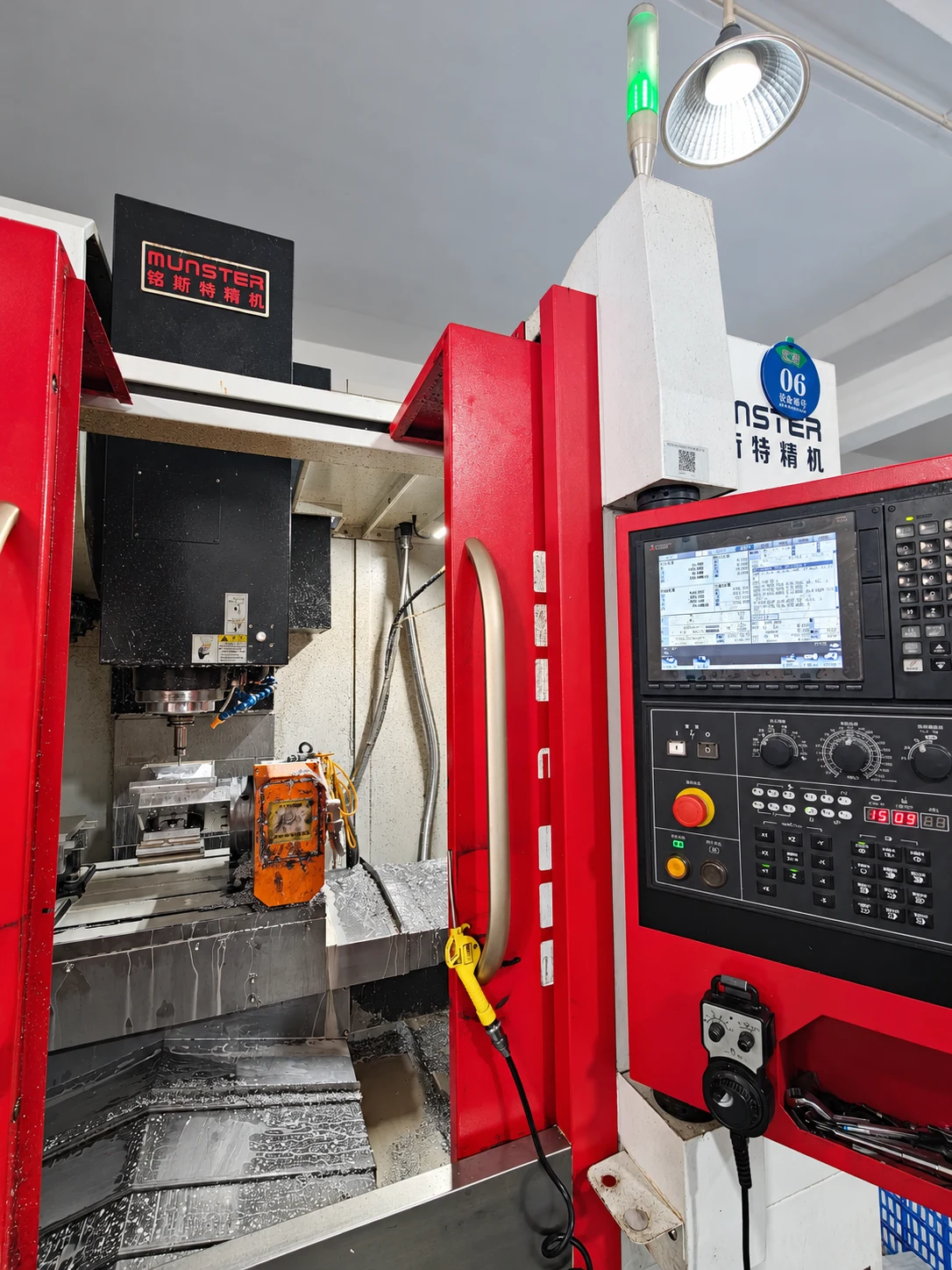 CNC machine, work area and control panel